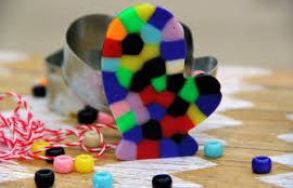 Bead Ornament: Made with beads in cookie cutter on wax paper and put in oven