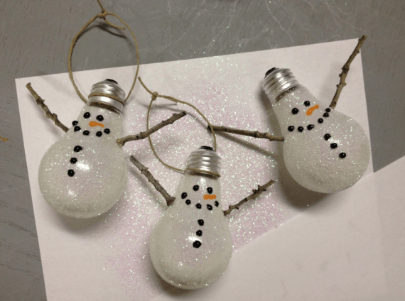 Snowman: Lightbulbs dipped in glitter with glued stick arms